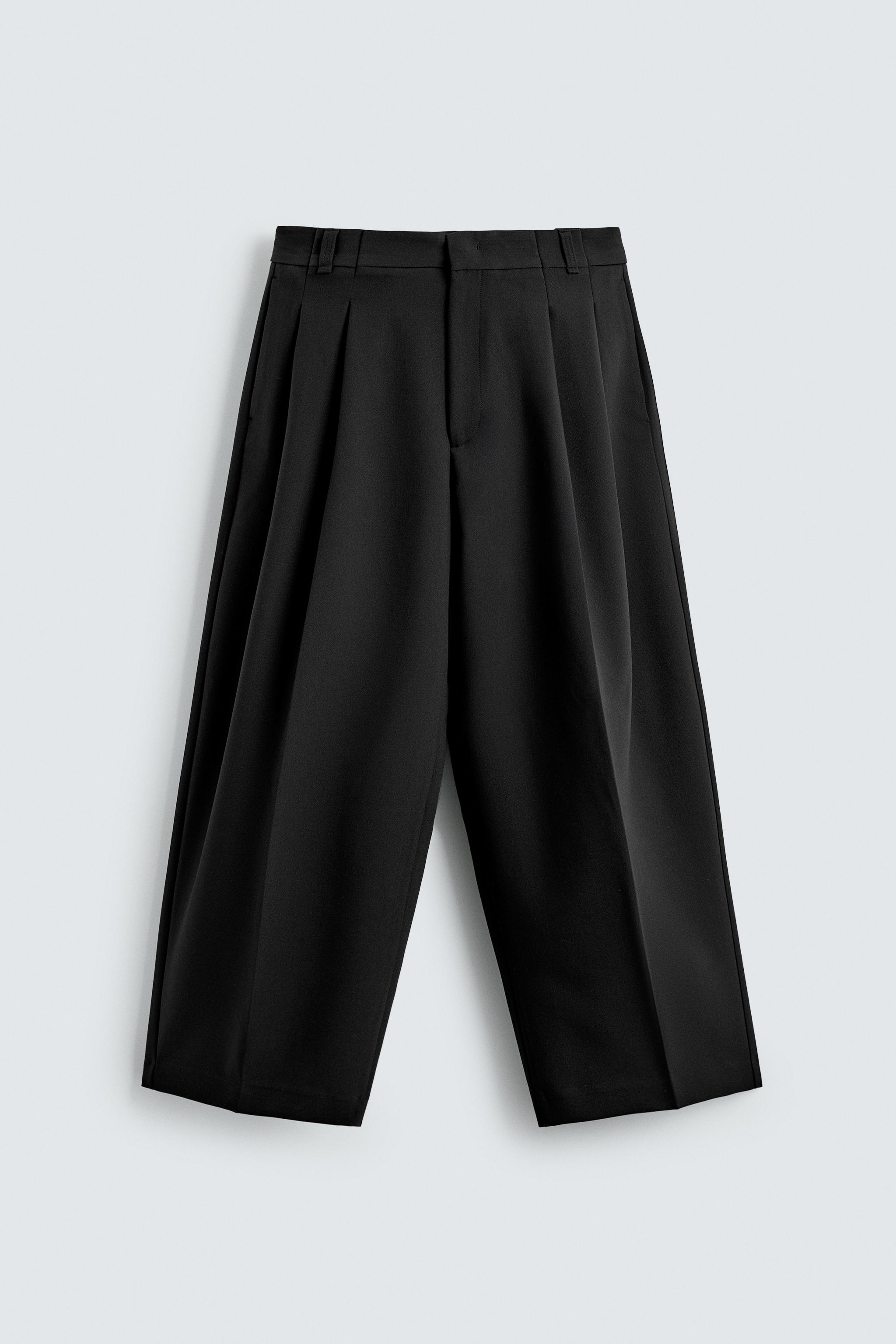 PANTALON COUPE LARGE À PLIS